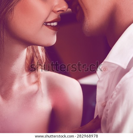 Square photo of couple kissing each others. without eyes only lips. square photo