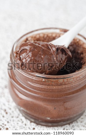 chocolate paste in a glass jar closeup