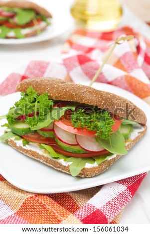 Healthy food - sandwich with cottage cheese and vegetables, vertical close-up