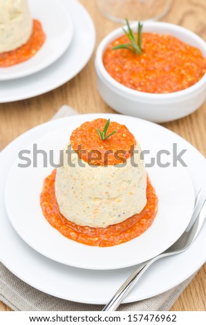 mousse of chicken with pumpkin, green and red pepper sauce