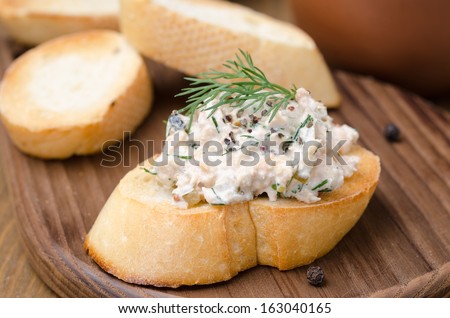 pate of smoked fish with sour cream and dill on toasted bread