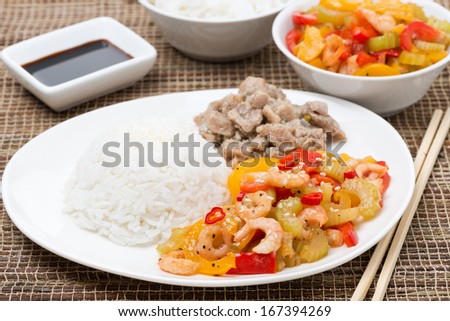 Chinese food - white rice, chicken and vegetables with shrimp, horizontal