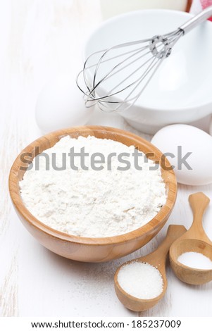 flour, salt, sugar and eggs for baking, vertical