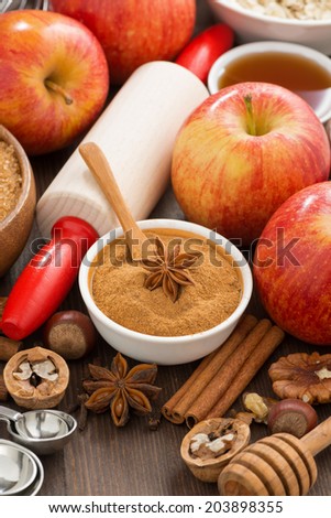 ingredients and spices for baking apple pie, top view, vertical, close-up
