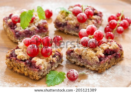 berry tart with fresh red currants, selective focus, close-up