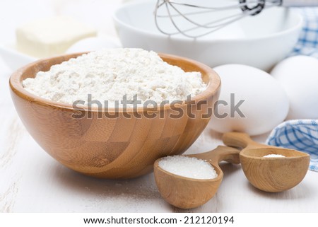 flour, salt, sugar and eggs for baking pancakes, close-up, horizontal