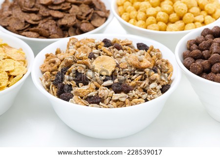granola and various breakfast cereals, close-up