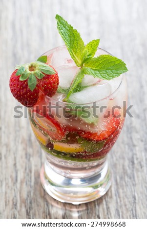 refreshing strawberry and citrus lemonade with mint, top view