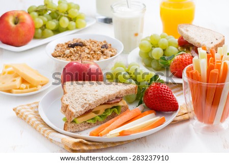 healthy school breakfast with fruits and vegetables, close-up