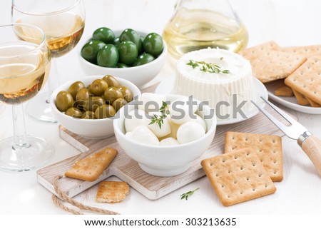 soft cheeses, crackers and pickles, horizontal
