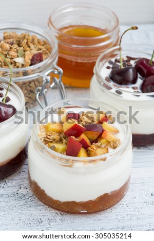dessert with cream, peach and cherry  jam, top view, vertical
