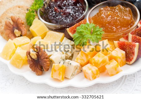 delicious cheese and fruit plate to the holiday, closeup, horizontal