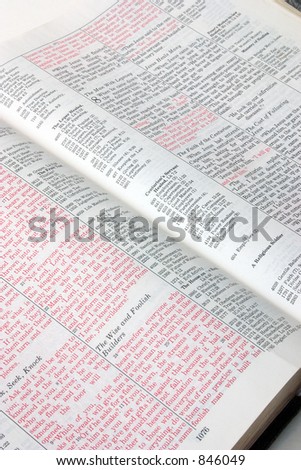 An open bible showing the red lettering depicting the words of Jesus