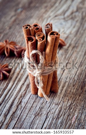 Cinnamon sticks  on wooden background