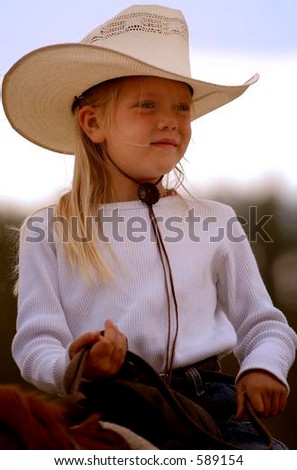 Little Cowgirl on Horseback #1