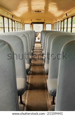 Get on the Bus - view down aisle of empty school bus