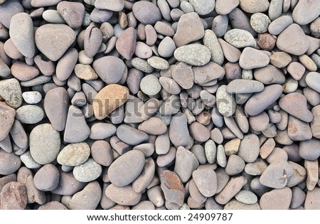 Lake Superior Rocks - background of smooth edged rocks on shore of Lake Superior in Minnesota