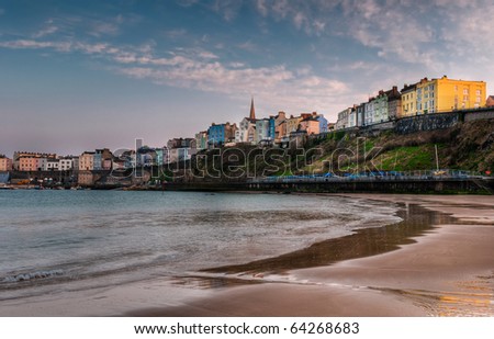 Tenby, Wales Sunset on the Beach - sun sets over the architecture and beach of Tenby (Dinbych-y-Pysgod) in South West Wales