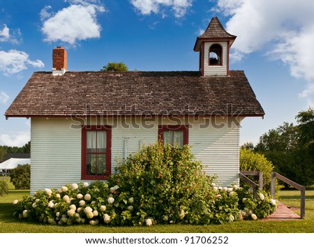 Side of One-Room Schoolhouse - historic one-room schoolhouse on summer day