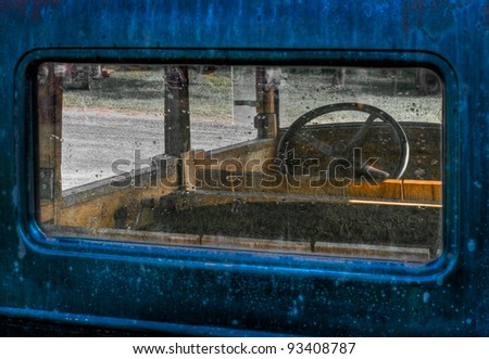 Through the Back Window - view of interior of old blue truck with wooden interior