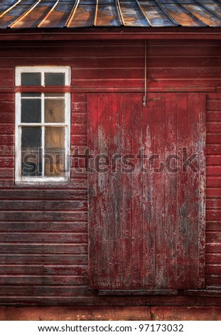 Old Red Building - worn side of red building, window and door