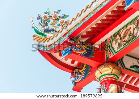 Colorful Chinese style roof eve with dragon and artwork