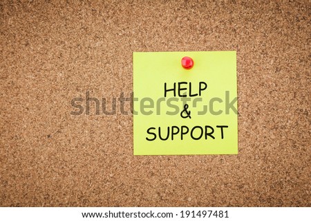 help and support concept, sticky pinned to cork board with room for text.