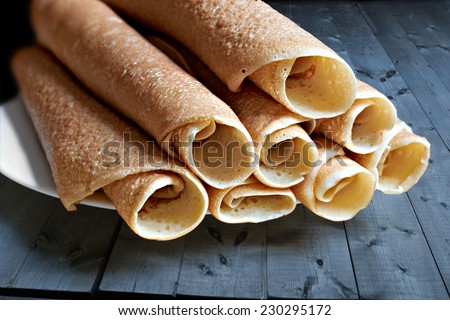 pancakes, rolled and laid the slide on the plate
