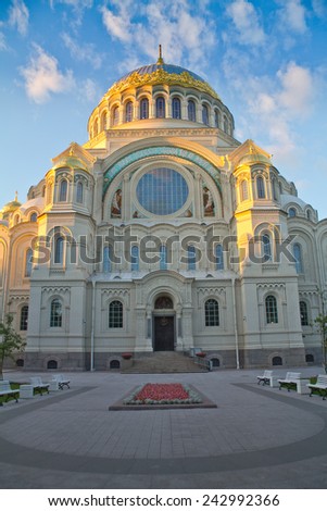 Naval Cathedral in Kronstadt lit sunsets sunshine, the view from the west side