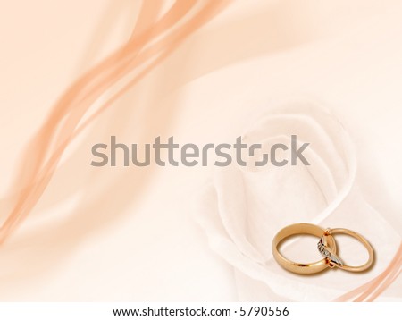 stock photo Design two wedding golden rings on smooth background