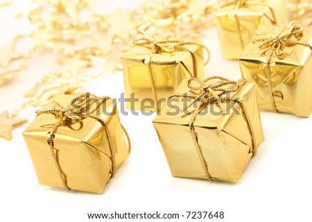 Golden christmas gift boxes isolated