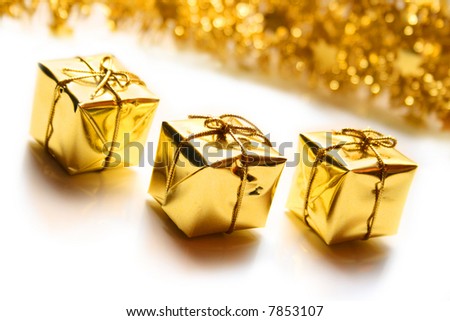 Golden christmas gift boxes isolated