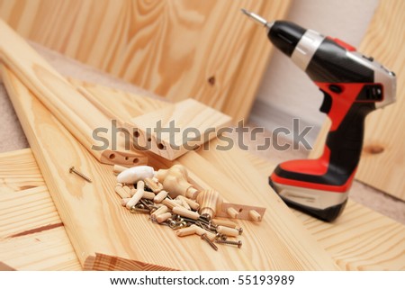 Mounting wooden furniture with cordless screwdriver
