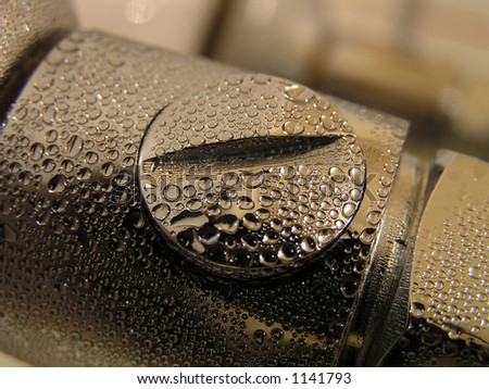 Drops of water on metal