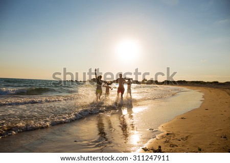Young family on the beach
