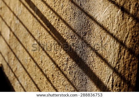 beautiful play of shadow and wall art forming a great abstract