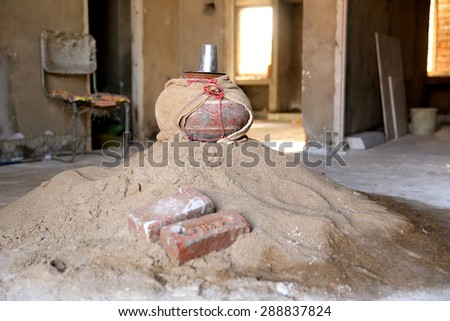 clay pot for drinking water at a construction site in india