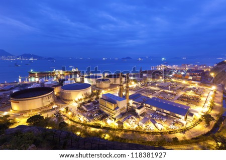 Industrial oil tanks at night