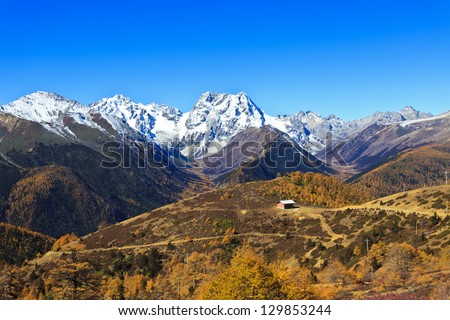 Snow mountain landscape in autumn