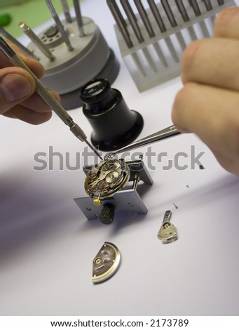 Inside of a watch. Repair. Focus on watch parts.