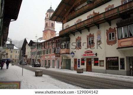 MITTENWALD, GERMANY--MARCH 21--A snow covered street in Mittenwald is deserted on March 21, 2008 because of  snow and being Good Friday.  Mittenwald is famous for the manufacture of violins.
