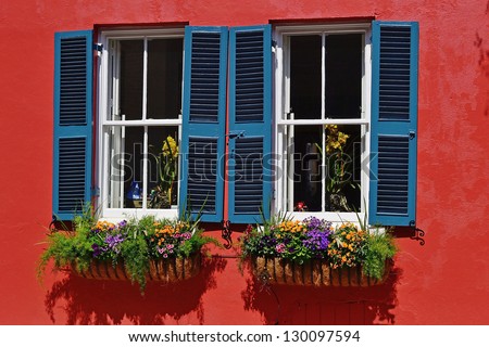 Windows of Charleston, SC show the tradition, beauty, color, and history of the historic city.