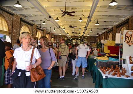 CHARLESTON, SC--MARCH 19:People flock to the Old Slave Market to shop on March 19, 2011.  Locals purchase stalls and sell their man-made goods to tourists at the Old Slave Market in Charleston, SC.