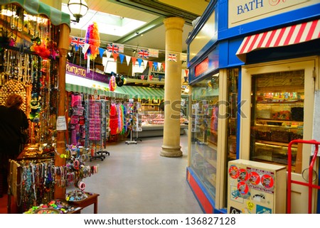 BATH, ENGLAND-MARCH 30: Tourists and locals shop the historic Guildhall Market on March 30, 2013. The market has been serving the community for around 800 years.