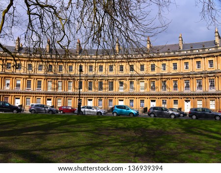 BATH, ENGLAND-MARCH 29: Visitors to Bath are treated to the history and architecture of the Circus on a sunny March 29, 2013. The area around Bath has been occupied since the Roman rule of Britain.