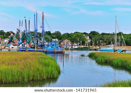 MOUNT PLEASANT, SOUTH CAROLINA-JUNE 8: People enjoy a beautiful June 8, 2013 and enjoy their boats and each other. Mount Pleasant is a large suburban town in Charleston County, South Carolina.
