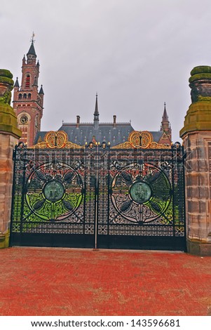 HAGUE, NETHERLANDS-APRIL 14: The entrance gate to the International Peace Palace in Hague,Netherlands on April 14, 2013. The Peace Palace houses the International Court of Justice