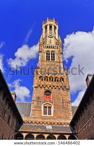 BRUGES, BELGIUM-APRIL 18: The Belfry of Bruges on April 18, 2013. Bruges has a significant economic importance thanks to its port. At one time, it was the \