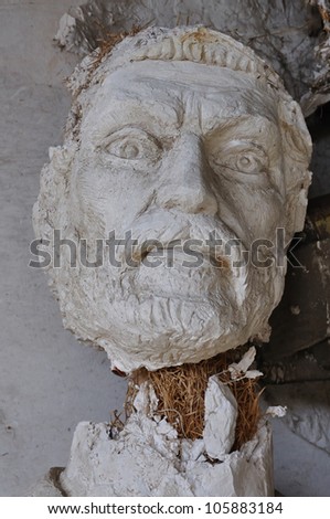 ATHENS - FEBRUARY 3: Plaster sculpture ancient god Zeus broken statue head in the abandoned studio of sculptor Nikolaos Pavlopoulos in Athens Greece, February 3, 2012.