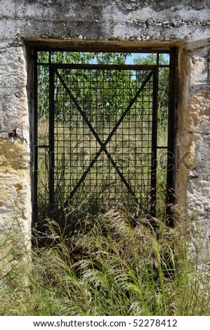 Vintage metal door frame in the country.